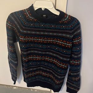 A wool knitted quilt patterned H&M sweater